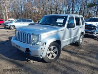 2010 Jeep Liberty Sport with VIN 1J4PN2GK5AW131498, listed as a IAAI auction lot 41099298 with 142,735 mi miles. Bid and sale history available at carsss.com. Image 6.