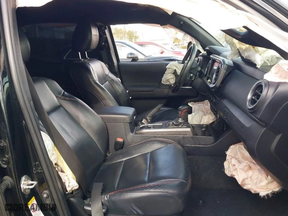 2019 Toyota Tacoma 4WD SR with VIN 5TFCZ5AN5KX193668, listed as a IAAI auction lot 41248429 with 60,812 mi miles. Bid and sale history available at carsss.com. Image 5.