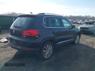 2012 Volkswagen Tiguan SE with VIN WVGAV7AX3CW531264, listed as a IAAI auction lot 41651242 with 190,669 mi miles and . Bid and sale history available at DreamBid. Image 4.
