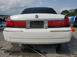 2000 Mercury Grand Marquis GS z VIN 2MEFM74WXYX699560, wystawiony jako Copart lot #57721925 z przebiegiem 246 297 mil mil oraz Szkoda całkowita • Salvage title. Historia ofert i sprzedaży dostępna na DreamBid. Obrazek 6.