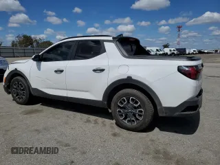 2023 Hyundai Santa Cruz SEL z VIN 5NTJC4AE3PH046045, wystawiony jako Copart lot #51332055 z przebiegiem 50 113 mil mil oraz Szkoda całkowita • Salvage title. Historia ofert i sprzedaży dostępna na DreamBid. Obrazek 2.
