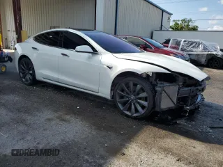 2017 Tesla Model S 100D z VIN 5YJSA1E21HF229936, wystawiony jako Copart lot #54734955 z przebiegiem 125 511 mil mil oraz Szkoda całkowita • Salvage title. Historia ofert i sprzedaży dostępna na DreamBid. Obrazek 4.