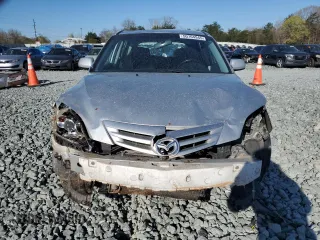 2005 Mazda 3 s with VIN JM1BK143051292702, listed as a Copart auction lot 50704945 with 250,503 mi miles and Salvage Title. Bid and sale history available at carsss.com. Image 5.