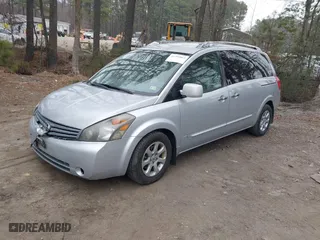 2009 Nissan Quest SL with VIN 5N1BV28U59N105982, listed as a IAAI auction lot 41795063 with 127,008 mi miles. Bid and sale history available at carsss.com. Image 2.