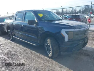 2023 Ford F-150 Lightning Pro with VIN 1FTVW1EL0PWG28578, listed as a IAAI auction lot 41647287 with 18,240 mi miles. Bid and sale history available at carsss.com. Image 1.