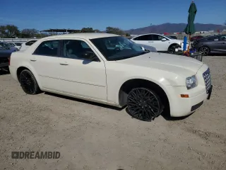 2005 Chrysler 300 with VIN 2C3JA43R75H161102, listed as a Copart auction lot 50101015 with 88,027 mi miles and Salvage Title. Bid and sale history available at carsss.com. Image 4.