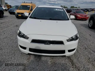 2014 Mitsubishi Lancer ES with VIN JA32U2FUXEU013663, listed as a Copart auction lot 54144165 with 68,527 mi miles and Salvage Title. Bid and sale history available at DreamBid. Image 5.