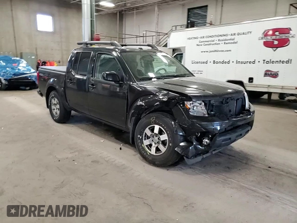 2011 Nissan Frontier Pro-4X with VIN 1N6AD0EVXBC449326, listed as a Copart auction lot 54994455 with 93,841 mi miles and Salvage title. Bid and sale history available at DreamBid. Image 14.