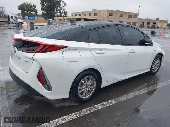 2021 Toyota Prius LE with VIN JTDKAMFP0M3169019, listed as a IAAI auction lot 41481098 with 84,304 mi miles and . Bid and sale history available at DreamBid. Image 4.