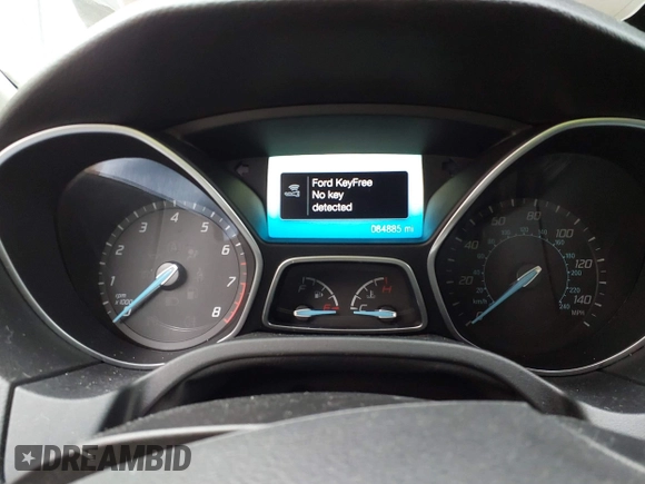 2014 Ford Focus Titanium with VIN 1FADP3J25EL310199, listed as a IAAI auction lot 40682901 with 84,885 mi miles and . Bid and sale history available at DreamBid. Image 7.