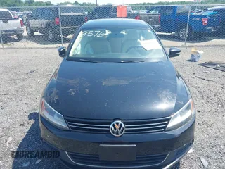 2014 Volkswagen Jetta SE with VIN 3VWD17AJ4EM429576, listed as a IAAI auction lot 42542604 with 142,313 mi miles and . Bid and sale history available at DreamBid. Image 12.