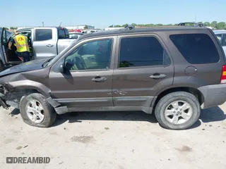 2007 Ford Escape XLT with VIN 1FMYU03167KA10635, listed as a IAAI auction lot 42009859 with 1 mi miles. Bid and sale history available at carsss.com. Image 14.