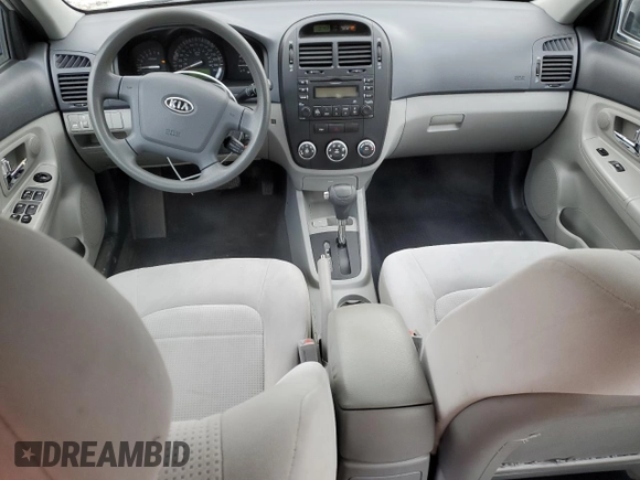 2009 Kia Spectra EX with VIN KNAFE221195655309, listed as a Copart auction lot 46620985 with 105,607 mi miles and Salvage Title. Bid and sale history available at DreamBid. Image 8.