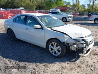2012 Ford Fusion SE with VIN 3FAHP0HA9CR402640, listed as a IAAI auction lot 42052610 with 210,441 mi miles and . Bid and sale history available at carsss.com. Image 1.