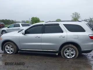 2012 Dodge Durango Crew with VIN 1C4RDJDG0CC322388, listed as a IAAI auction lot 42179814 with 124,009 mi miles and . Bid and sale history available at carsss.com. Image 14.