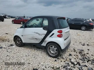 2013 Smart fortwo Pure with VIN WMEEJ3BA1DK633239, listed as a Copart auction lot 54829205 with 147,647 mi miles and Salvage Title. Bid and sale history available at carsss.com. Image 2.