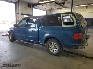 2001 Ford F-150 SuperCrew XLT with VIN 1FTRW08LX1KE90912, listed as a Copart auction lot 48596235 with 282,953 mi miles and Salvage Title. Bid and sale history available at carsss.com. Image 2.