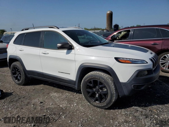 2015 Jeep Cherokee Trailhawk z VIN 1C4PJMBS6FW558653, wystawiony jako Copart lot #51066195 z przebiegiem 32 905 mil mil oraz Szkoda całkowita • Salvage title. Historia ofert i sprzedaży dostępna na DreamBid. Obrazek 4.