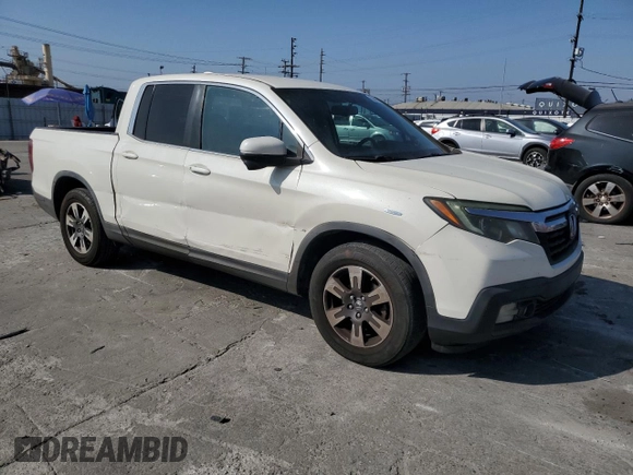 2017 Honda Ridgeline RTL-T with VIN 5FPYK2F65HB011097, listed as a Copart auction lot 63687965 with 186,157 mi miles and Salvage title. Bid and sale history available at DreamBid. Image 4.
