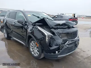 2020 Cadillac XT4 AWD Premium Luxury with VIN 1GYFZDR47LF122394, listed as a IAAI auction lot 41703115 with 69,366 mi miles. Bid and sale history available at carsss.com. Image 1.