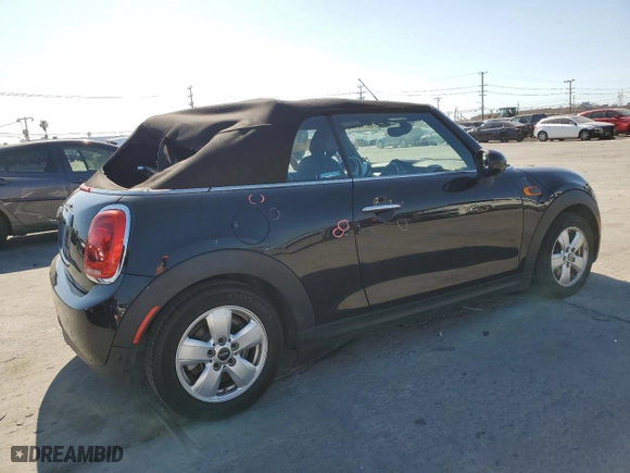 2019 MINI Cooper Convertible with VIN WMWWG5C59K3H08999, listed as a Copart auction lot 49778175 with 35,879 mi miles and Salvage Title. Bid and sale history available at carsss.com. Image 3.