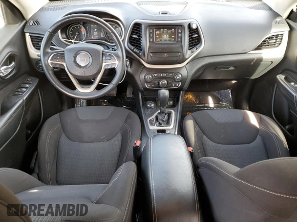 2016 Jeep Cherokee Altitude with VIN 1C4PJMCS9GW254796, listed as a Copart auction lot 44004445 with 96,189 mi miles and Salvage title. Bid and sale history available at DreamBid. Image 8.