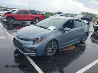 2022 Toyota Corolla SE with VIN 5YFS4MCE2NP127633, listed as a IAAI auction lot 41934935 with 34,794 mi miles. Bid and sale history available at carsss.com. Image 2.