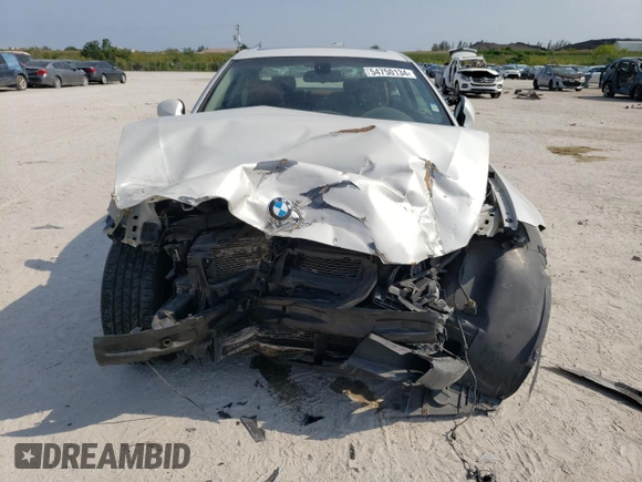 2012 BMW 3 Series 328i xDrive with VIN WBAKF5C55CE656890, listed as a Copart auction lot 54750134 with 68,914 mi miles and Salvage Title. Bid and sale history available at carsss.com. Image 5.