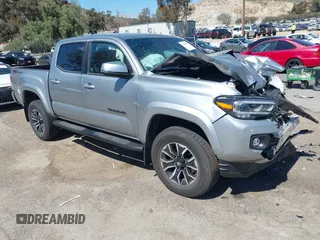 2023 Toyota Tacoma SR5 z VIN 3TMAZ5CN7PM202629, wystawiony jako IAAI lot #41818277 z przebiegiem 23 641 mil mil oraz . Historia ofert i sprzedaży dostępna na DreamBid. Obrazek 1.