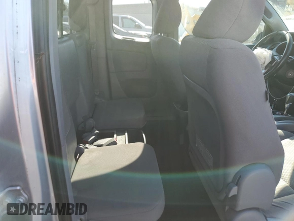 2013 Toyota Tacoma z VIN 5TFUX4EN3DX018529, wystawiony jako Copart lot #77794934 z przebiegiem 186 050 mil mil oraz Szkoda całkowita • Salvage title. Historia ofert i sprzedaży dostępna na DreamBid. Obrazek 10.