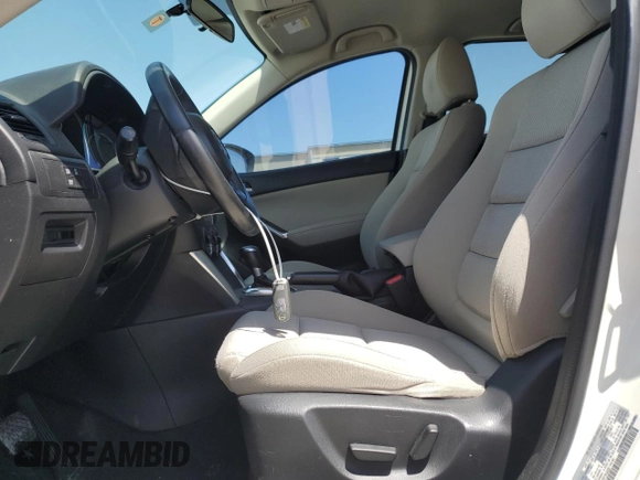 2015 Mazda CX-5 Touring with VIN JM3KE2CY5F0548826, listed as a Copart auction lot 52686565 with 139,602 mi miles and Salvage Title. Bid and sale history available at carsss.com. Image 7.