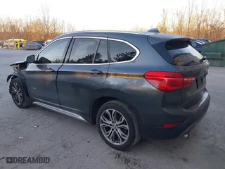 2017 BMW X1 xDrive28i with VIN WBXHT3C33H5F87591, listed as a IAAI auction lot 41256899 with 69,362 mi miles. Bid and sale history available at carsss.com. Image 3.