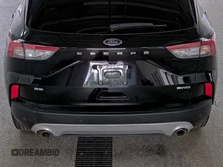 2021 Ford Escape SE with VIN 1FMCU9G60MUA42842, listed as a IAAI auction lot 42791500 with 91,398 mi miles and . Bid and sale history available at DreamBid. Image 7.