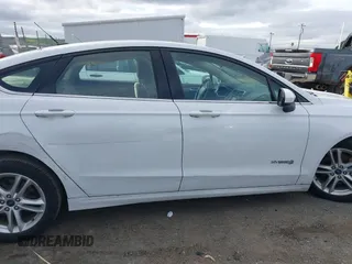 2018 Ford Fusion SE z VIN 3FA6P0LU5JR188171, wystawiony jako IAAI lot #41632358 z przebiegiem 73 677 mil mil oraz . Historia ofert i sprzedaży dostępna na DreamBid. Obrazek 13.