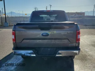 2020 Ford F-150 XL with VIN 1FTEW1EP3LKD10572, listed as a IAAI auction lot 42225845 with 137,060 mi miles. Bid and sale history available at carsss.com. Image 2.