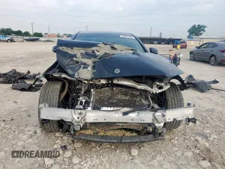2019 Mercedes-Benz E 300 with VIN WDDZF4JB2KA618999, listed as a Copart auction lot 56915465 with 64,077 mi miles and Salvage title. Bid and sale history available at DreamBid. Image 5.