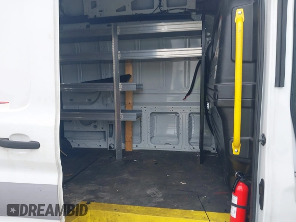 2020 Ford Transit Cargo with VIN 1FTBW3X86LKA66775, listed as a IAAI auction lot 42241856 with 66,985 mi miles and . Bid and sale history available at DreamBid. Image 8.