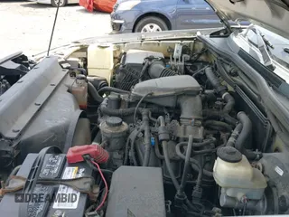 2014 Toyota Tacoma with VIN 5TFUX4EN0EX029652, listed as a IAAI auction lot 42150630 with 208,098 mi miles and . Bid and sale history available at DreamBid. Image 19.