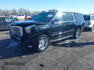 2016 GMC Yukon XL SLT with VIN 1GKS2GKC0GR443634, listed as a IAAI auction lot 41379064 with 121,744 mi miles. Bid and sale history available at carsss.com. Image 2.