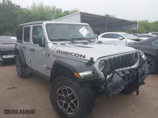 2024 Jeep Wrangler Rubicon with VIN 1C4PJXFG7RW252959, listed as a IAAI auction lot 41955302 with 27,727 mi miles. Bid and sale history available at carsss.com. Image 1.