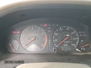 1999 Acura CL z VIN 19UYA325XXL009809, wystawiony jako Copart lot #73392444 z przebiegiem 79 668 mil mil oraz Szkody całkowita. Historia ofert i sprzedaży dostępna na DreamBid. Obrazek 9.
