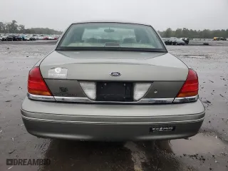 2001 Ford Crown Victoria LX with VIN 2FAFP74W71X139760, listed as a Copart auction lot 73740434 with 106,938 mi miles and Salvage Title. Bid and sale history available at carsss.com. Image 6.