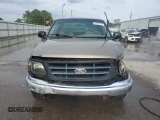 2003 Ford F-150 XL with VIN 1FTRX17LX3NA38576, listed as a Copart auction lot 54057495 with 173,811 mi miles and Salvage title. Bid and sale history available at DreamBid. Image 5.
