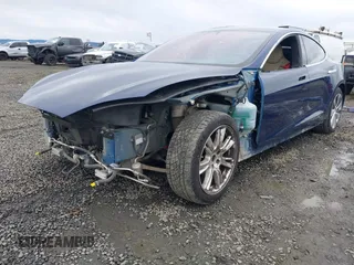 2017 Tesla Model S 100D with VIN 5YJSA1E25HF184502, listed as a IAAI auction lot 41834310 with 92,887 mi miles and . Bid and sale history available at DreamBid. Image 6.