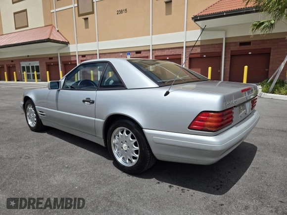 1996 Mercedes-Benz SL 320 with VIN WDBFA63F4TF138117, listed as a Copart auction lot 63440965 with 56,621 mi miles and Clean title. Bid and sale history available at DreamBid. Image 3.