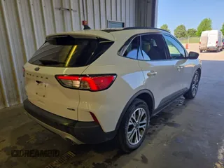 2021 Ford Escape SEL Hybrid with VIN 1FMCU9CZ1MUB25597, listed as a IAAI auction lot 42663573 with 79,061 mi miles and . Bid and sale history available at DreamBid. Image 8.