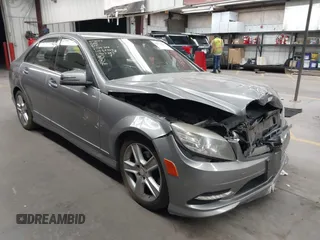 2011 Mercedes-Benz C 300 Sport with VIN WDDGF8BB2BR145328, listed as a IAAI auction lot 42554293 with 153,723 mi miles and . Bid and sale history available at DreamBid. Image 1.