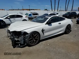 2022 BMW M8 Competition with VIN WBSAE0C06NCH25007, listed as a Copart auction lot 66153864 with 0 mi miles and Salvage Title. Bid and sale history available at carsss.com. Image 1.