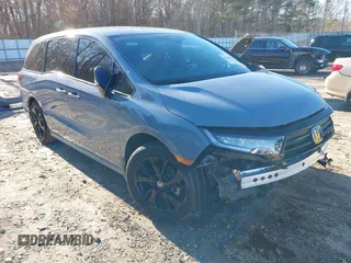 2024 Honda Odyssey Sport z VIN 5FNRL6H77RB056504, wystawiony jako IAAI lot #41606592 z przebiegiem 9 807 mil mil oraz . Historia ofert i sprzedaży dostępna na DreamBid. Obrazek 1.