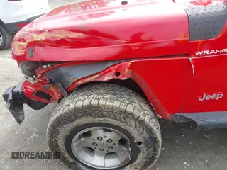 1999 Jeep Wrangler SE z VIN 1J4FY29P5XP487111, wystawiony jako IAAI lot #42125867 z przebiegiem 156 804 mil mil oraz . Historia ofert i sprzedaży dostępna na DreamBid. Obrazek 6.